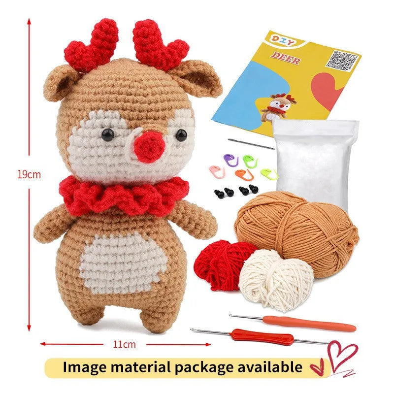 A brown crochet deer toy with red ears and a matching set of yarn and tools for making the animal.