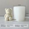 A white silicone candle mold shaped like a bear, used for DIY crafts.