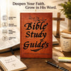 A leather-bound Bible Study Guide book with a cross on the cover, surrounded by related study materials and a wooden cross.