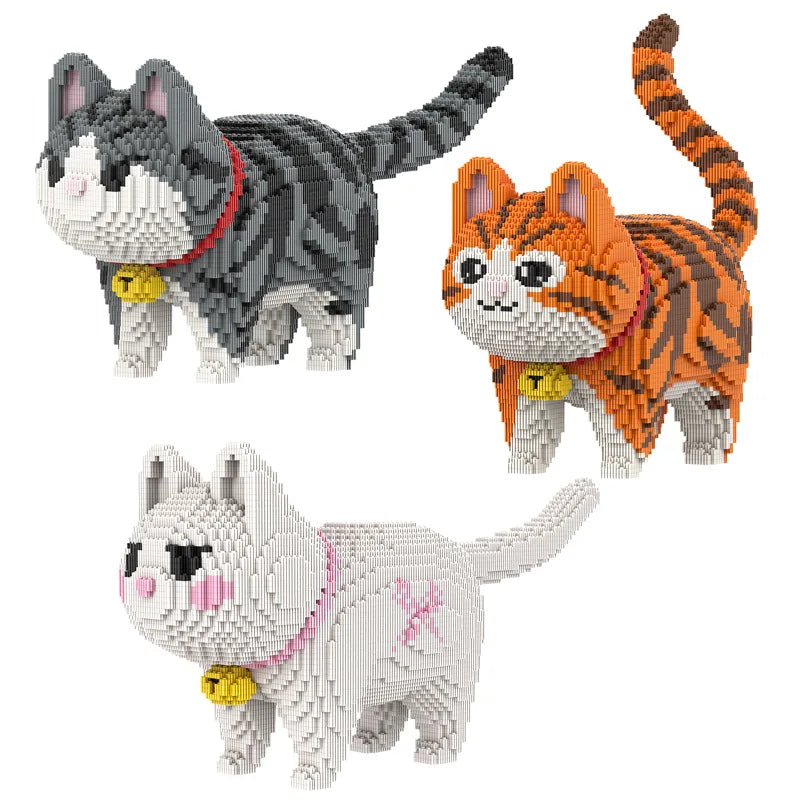A set of three miniature brick models depicting cats and a dog, including a gray tabby cat, an orange tabby cat, and a white 
