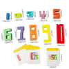 A set of wooden number building blocks in various colors and double-sided cards for early math learning.