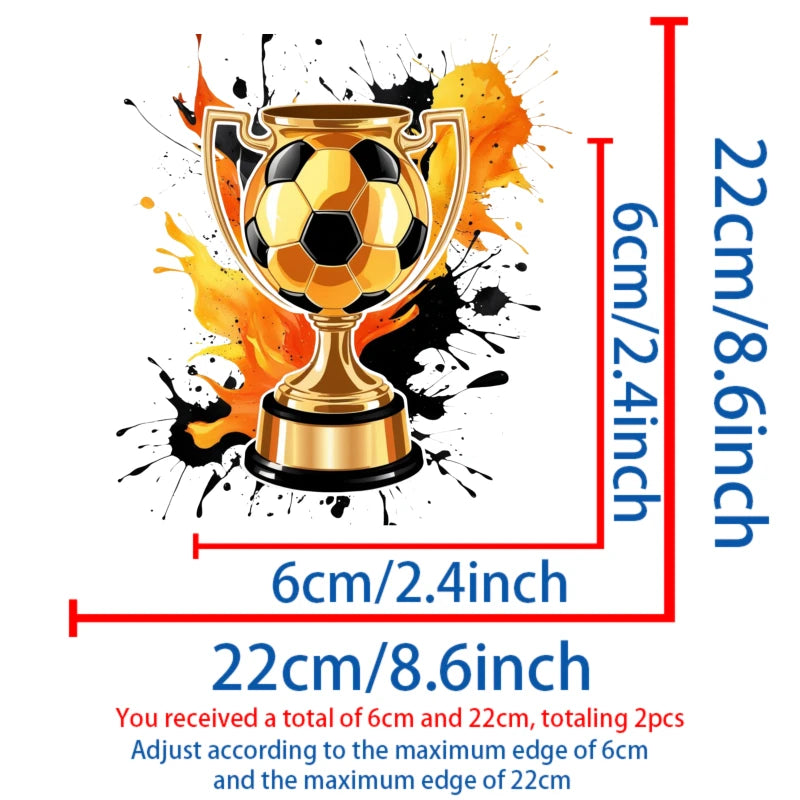 A gold trophy shaped like a soccer ball is shown with surrounding paint splashes, indicating an iron-on patch design.