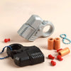 A silver mini shell-ejecting fidget pistol is shown next to several orange and red shell casings on a light background.