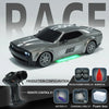 A gray high-speed 4WD drift RC race car model with accessories like a remote control, battery, charging cable, and foam box.