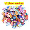 A collection of 10 random glow-in-the-dark loom band bracelet making components and beads.
