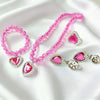 Pink beaded jewelry set for girls featuring a necklace and earrings on a white background