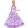 A female doll wearing a purple floral evening gown with pink accents and a light blue sash.