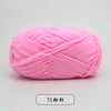 Pink pre-dyed milk cotton yarn in a skein for knitting and crochet