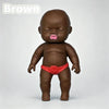 A brown squishy baby stress relief toy wearing a red outfit is shown against a light gray background.