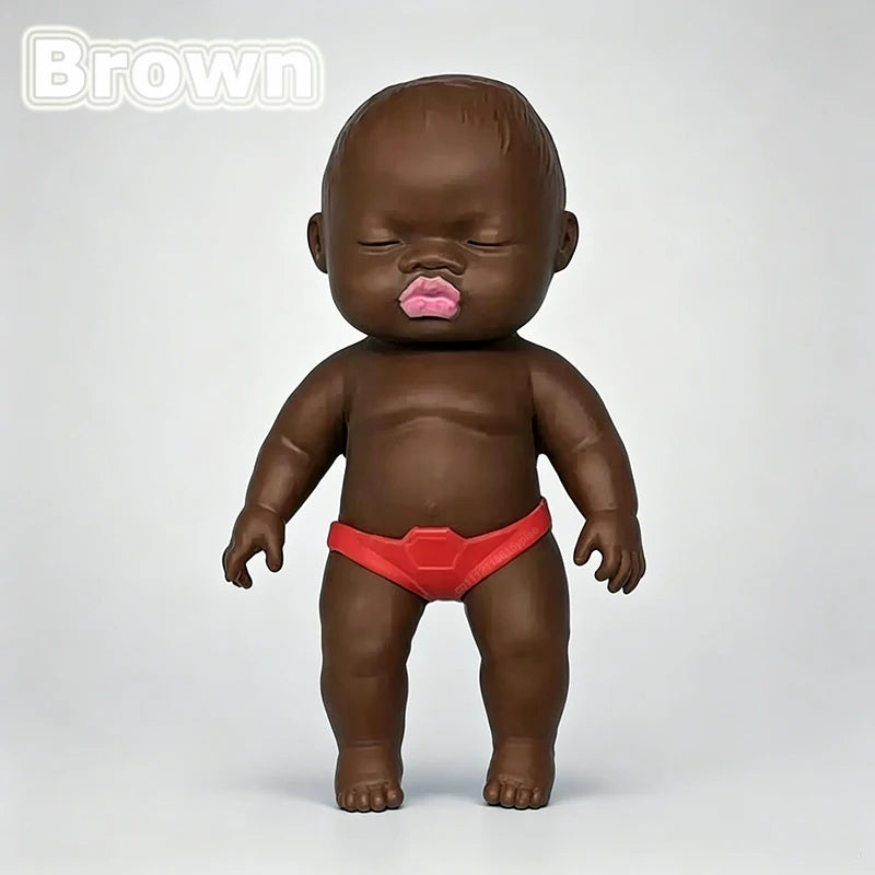 A brown squishy baby stress relief toy wearing a red outfit is shown against a light gray background.