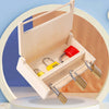 A wooden lock and key toy set displayed inside an open wooden box, used for a fun unlocking game.