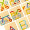 A collection of wooden Montessori pegboard puzzles featuring colorful wooden pegs and boards.