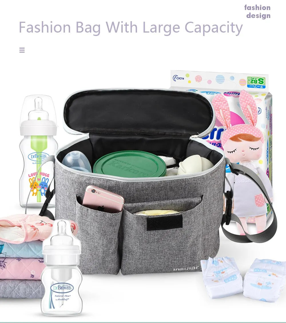 A gray fashion bag with a large capacity, featuring an interior organizer for bottles and accessories.