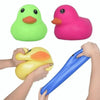 A set of bright green and pink squeeze duck stress relief toys being held by hands.