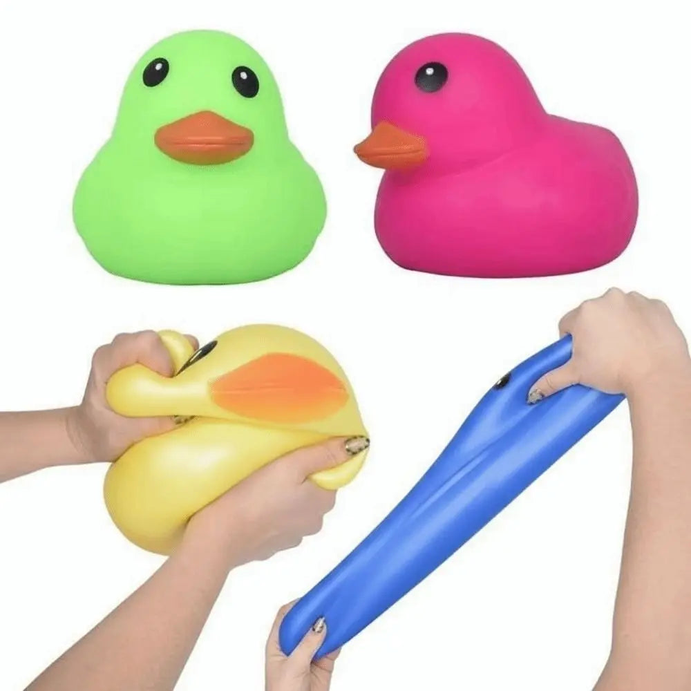 A set of bright green and pink squeeze duck stress relief toys being held by hands.