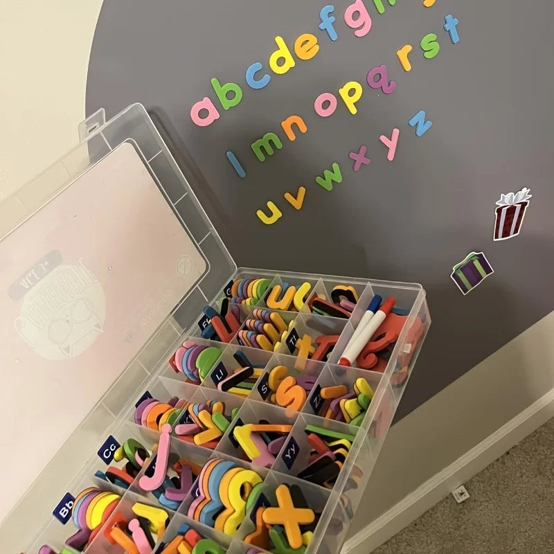 A clear plastic storage box filled with a colorful magnetic letter set for educational learning.