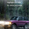 A purple 1980s SUV is shown in a forest setting, highlighting its LED lights for vehicle light linkage.