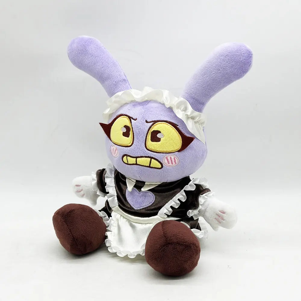 A purple plush doll resembling a rabbit with large ears and a frilly dress.