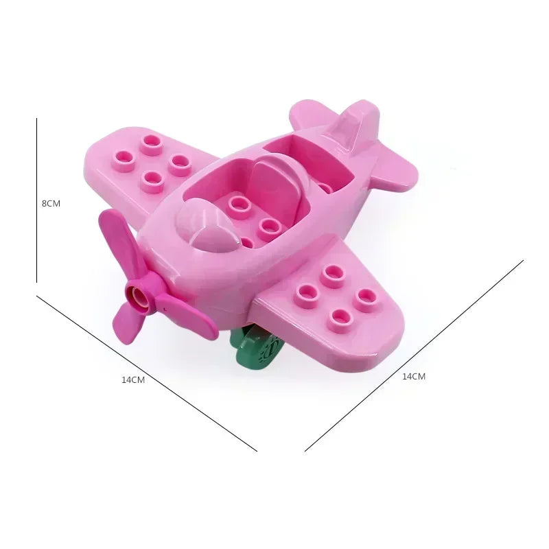 A pink city traffic vehicle building blocks set featuring trucks and buses.