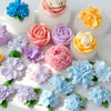 A collection of multi-flower silicone molds in various shades of pink, blue, and yellow used for DIY crafting.