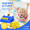 A young child is playing with yellow letter cubes and a blue matching game set for educational spelling.