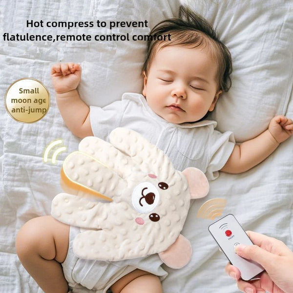 A baby is sleeping on a white sheet with a soft, white palm pillow attached to their clothing.