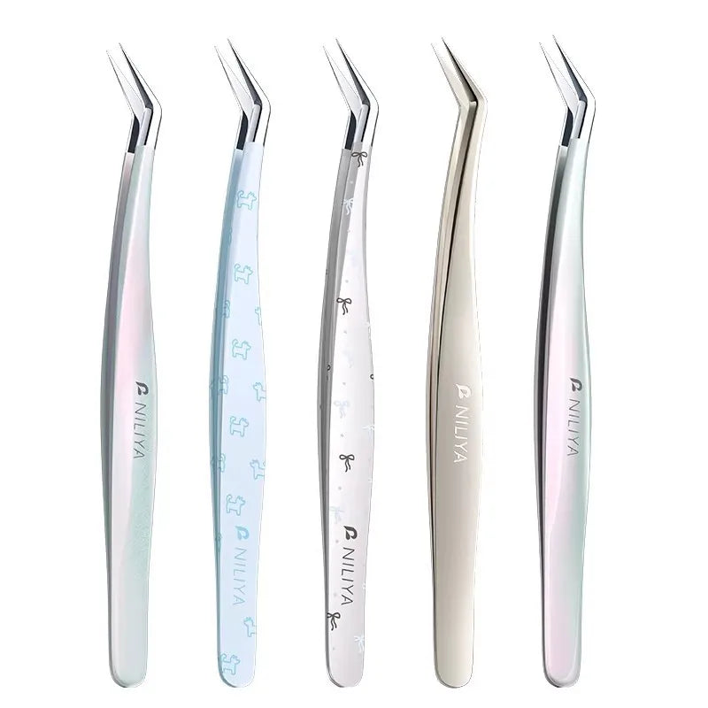 A set of five precision stainless steel tweezers for sticker crafting shown in various angles.
