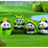 A set of adorable resin panda figurines in various poses and colors sitting on green grass.