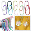 Various colored ball bead chains and finished jewelry pieces for DIY projects