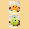 Jouet en peluche interactif de fruit jaune et vert avec de grands yeux et de petites pattes.