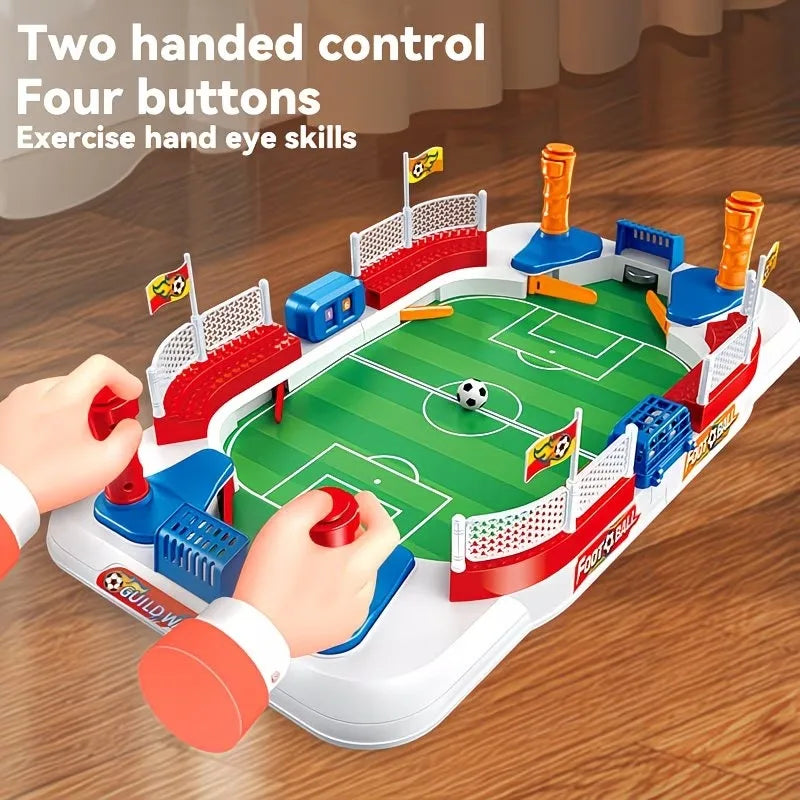 A hand operating a mini tabletop foosball game with four buttons and two hands to control the players on the green field.