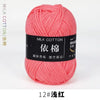 A ball of bright pink milk cotton yarn labeled 12# light pink thread for knitting and crochet.