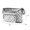 A gray and white patterned fabric organizer bag designed for strollers, featuring a zippered compartment and hanging hooks.