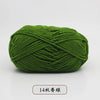 A ball of dark green pre-dyed milk cotton yarn used for knitting and crochet.