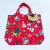 A red fabric bag featuring various cute animal designs and patterns, likely a plush toy storage item.