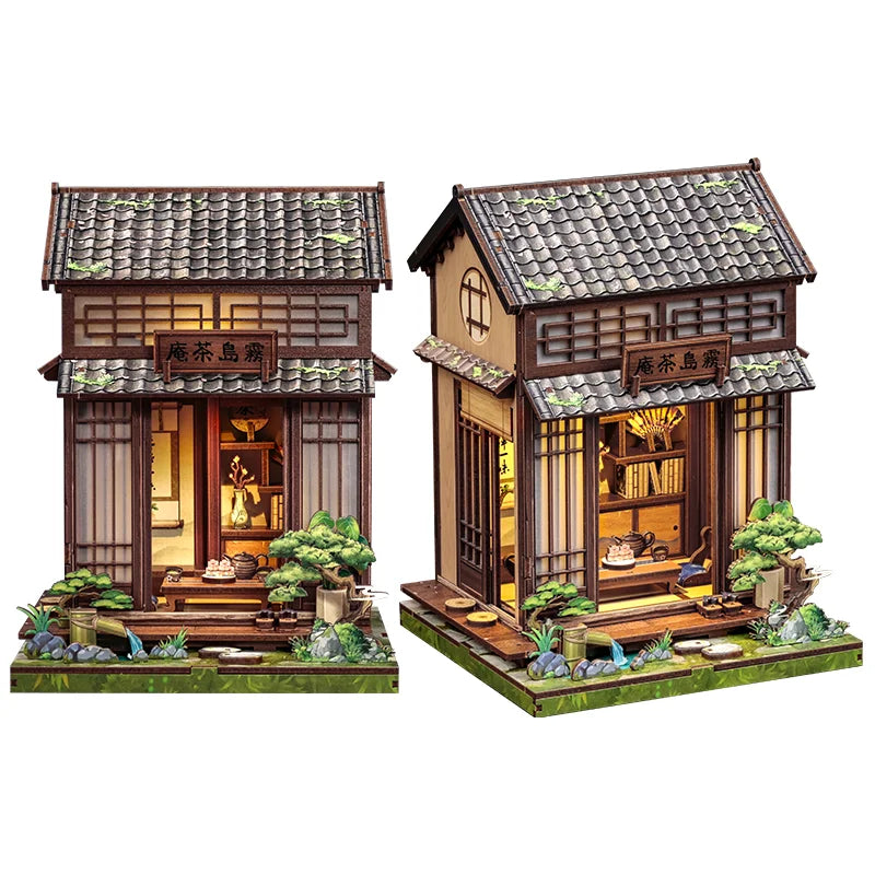A detailed 3D wooden book nook kit featuring a traditional Japanese-style building with LED lighting and miniature landscapin