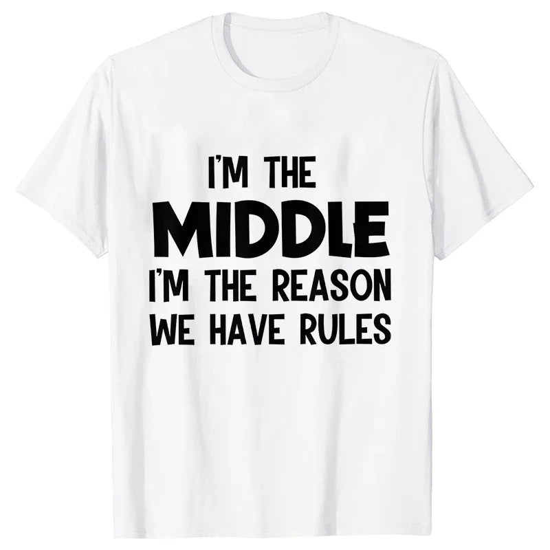 A white t-shirt with black text that reads I'm the middle I'm the reason we have rules
