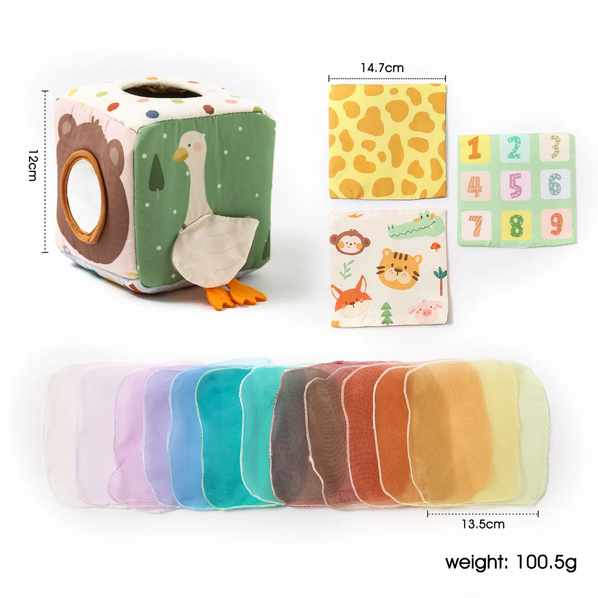 A green tissue box toy featuring a duck design and an accompanying cloth book with colorful pages.