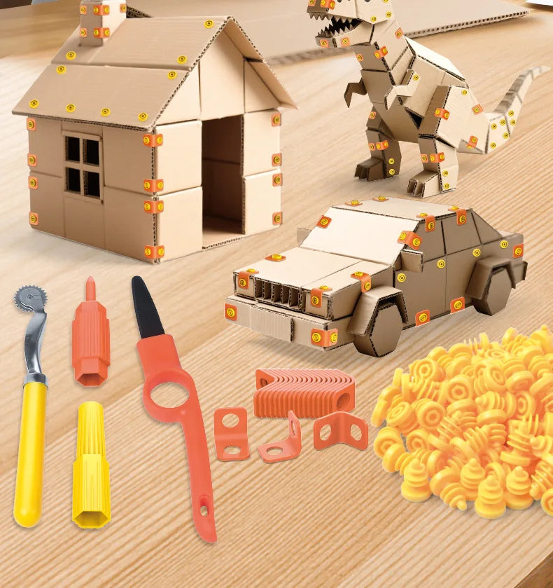 Cardboard construction kit for kids featuring a house model, tools like a hammer and knife, and storage box.
