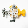 A wooden busy cube sensory learning toy with a yellow handle and silver mechanism.