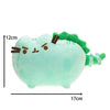 A light mint green plush cat doll with green accents and facial features, shown from the front.