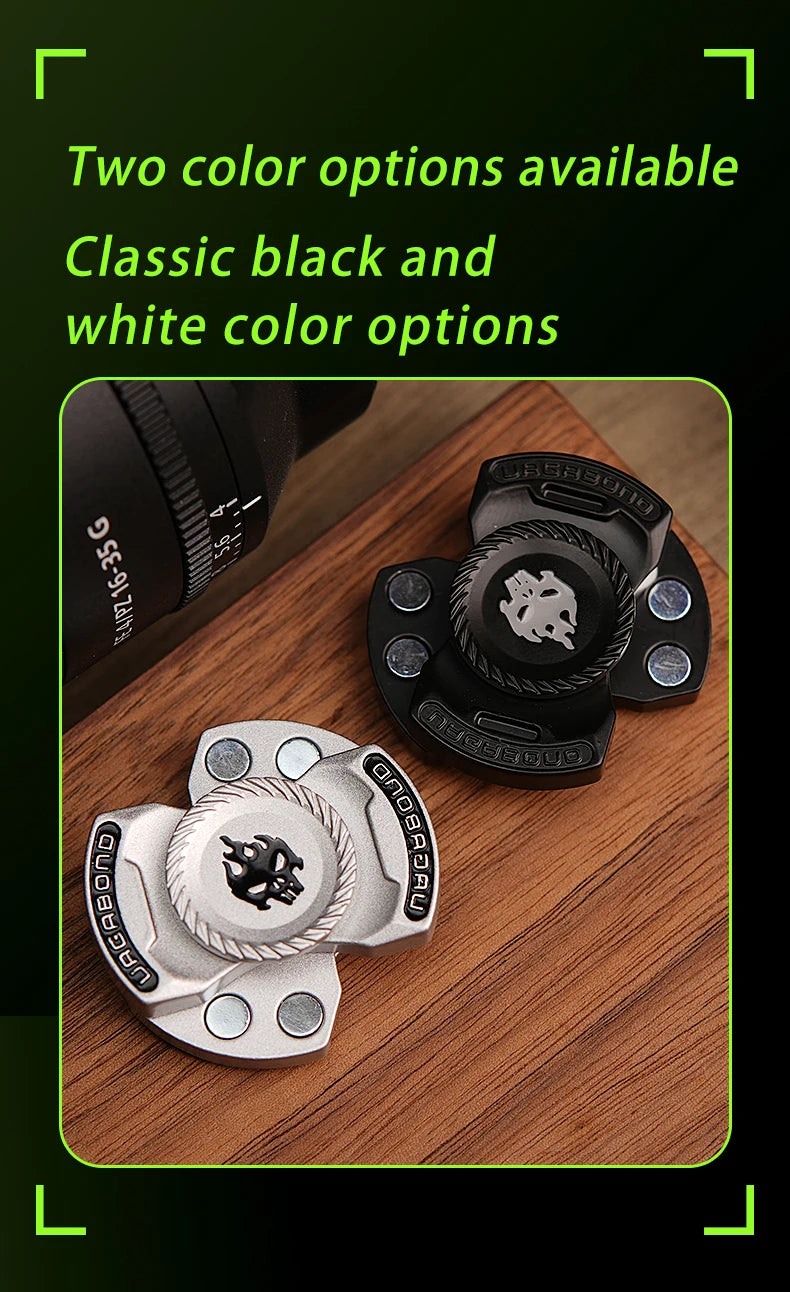 A black magnetic fidget spinner and a silver magnetic fidget spinner are shown on a wooden surface.