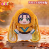 A plush blind box of a character from The Apothecary Diaries series with long yellow hair and purple accents.