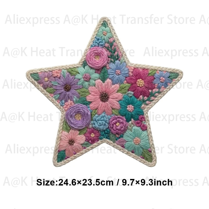 A star-shaped floral letter bow iron-on patch made of various colored fabric flowers