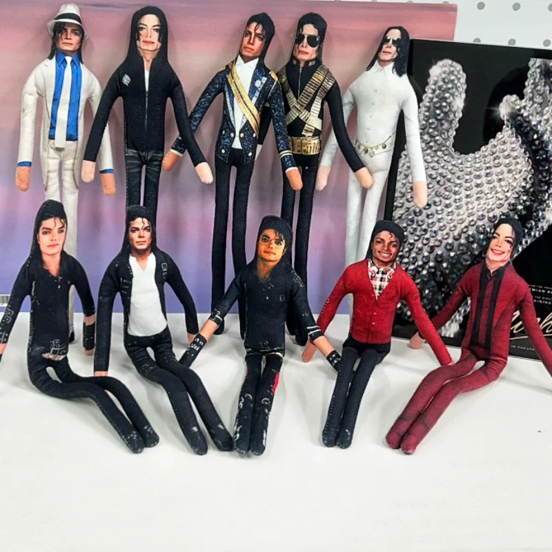 A collection of collectible plush dolls dressed in various styles and costumes standing against a pink background.