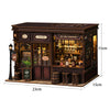 A detailed wooden miniature dollhouse kit featuring a shop facade with glass windows and lighting elements.