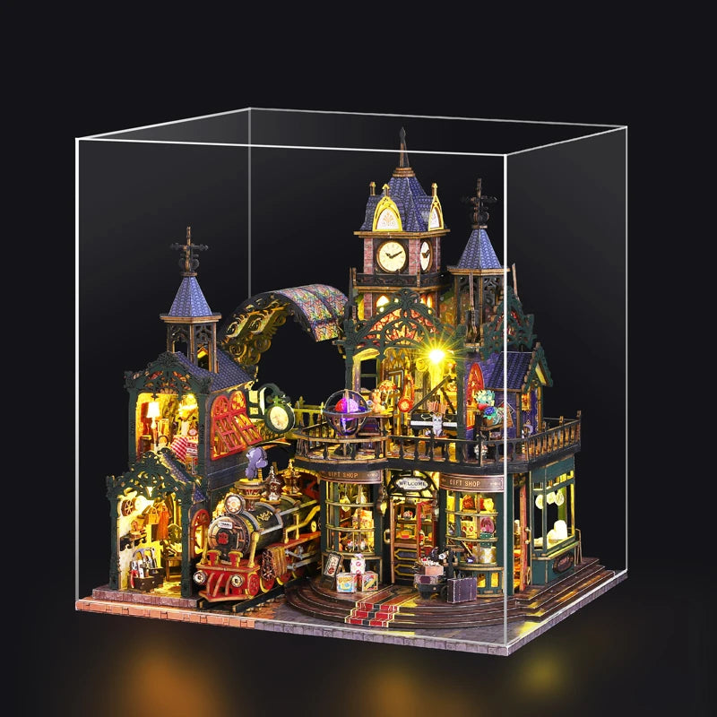 A detailed wooden miniature rail-track city dollhouse kit featuring a large clock tower and various buildings.
