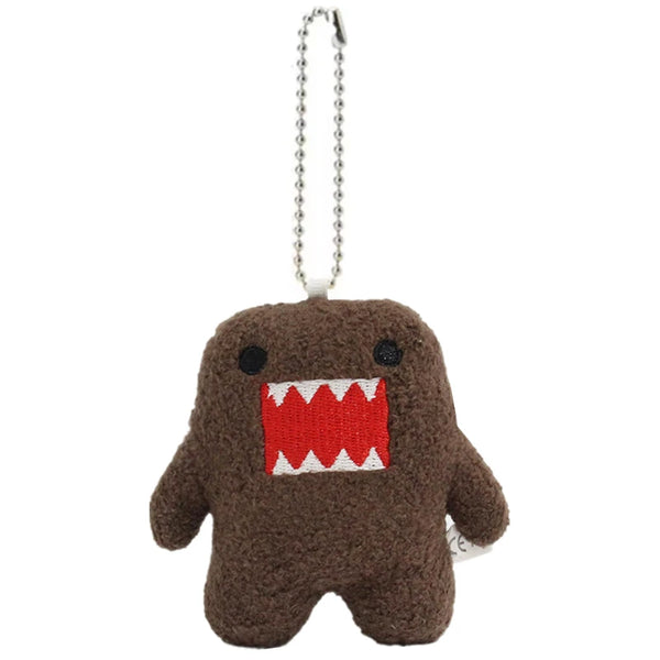 A dark brown, monster-shaped plush keychain charm with white teeth and a silver chain.