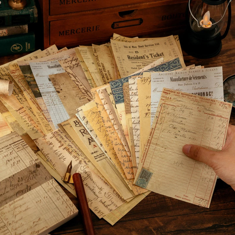 A collection of vintage decorative paper sheets and tickets used for scrapbooking and journaling