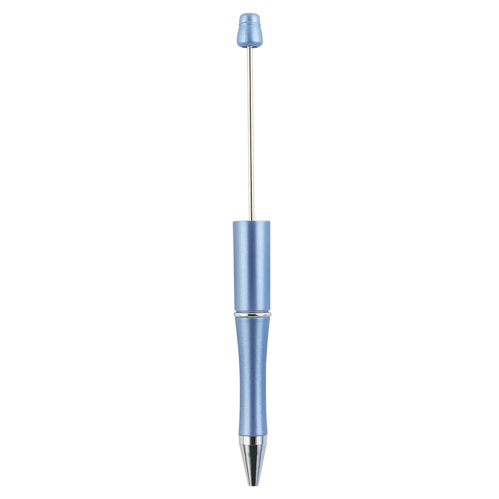 A slender, blue ballpoint pen with a silver tip and a decorative top.